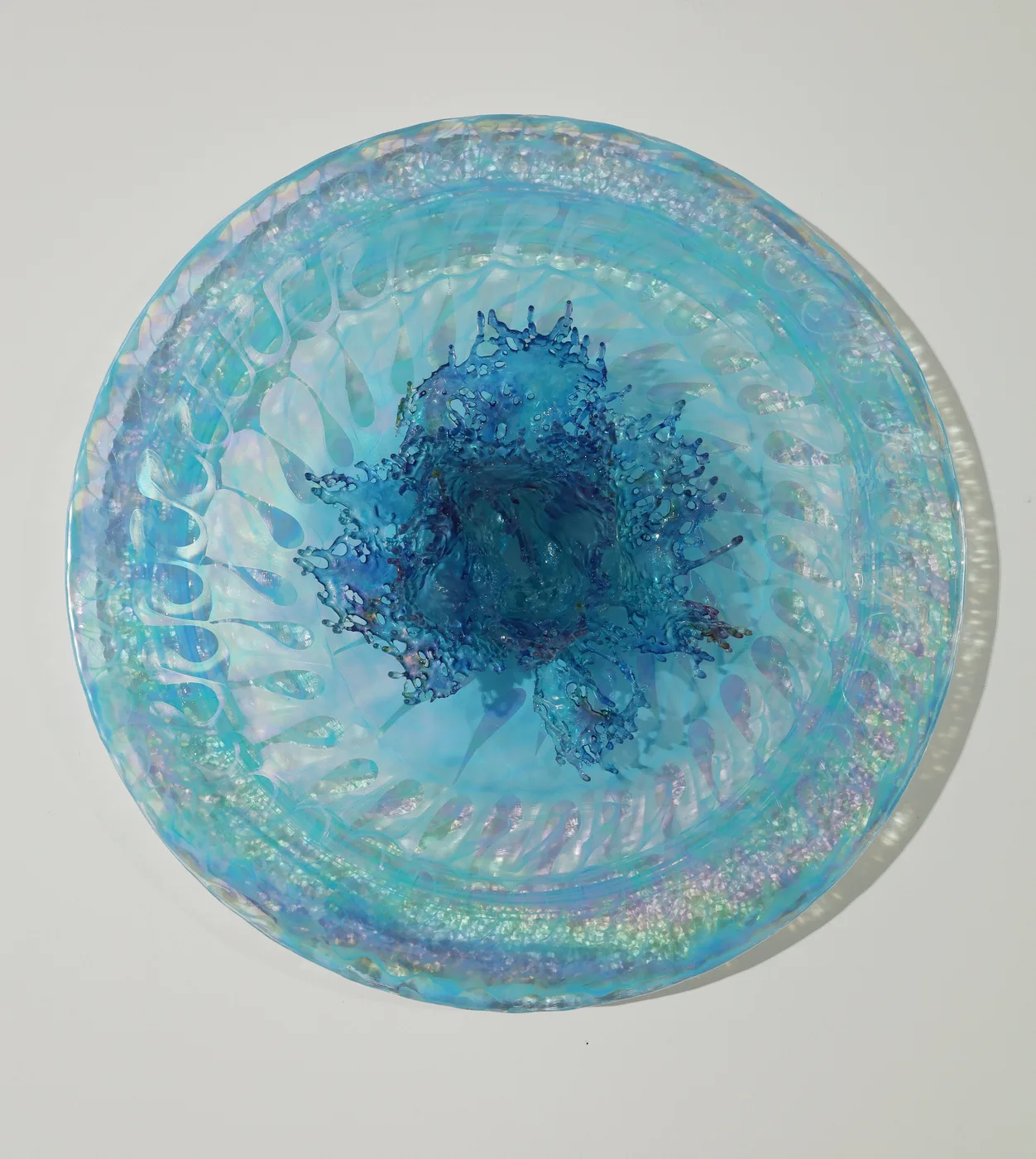 Annalù, Turquoise Lotus LED Light Disc: a blue resin flower bursting from the center of an iridescent turquoise Murano glass disc