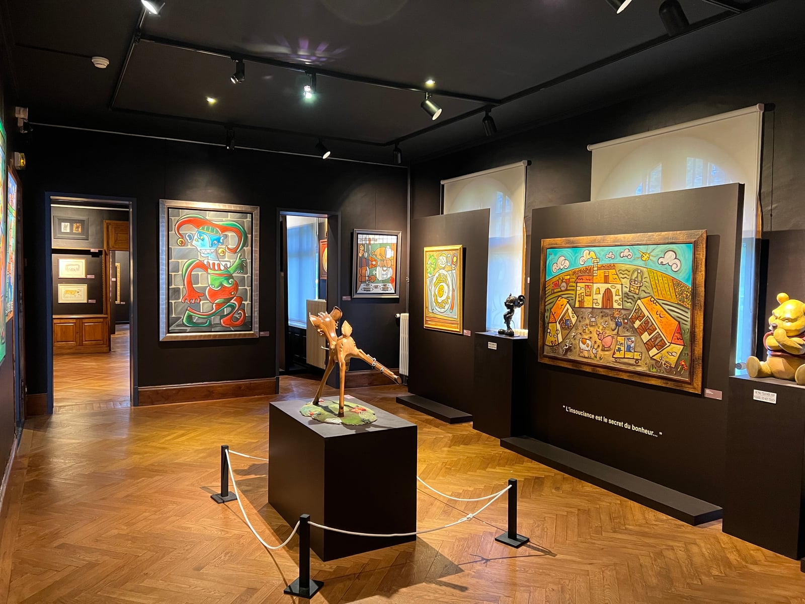 GODON BIO exhibition view: a bronze sculpture by Alain Godon among his paintings