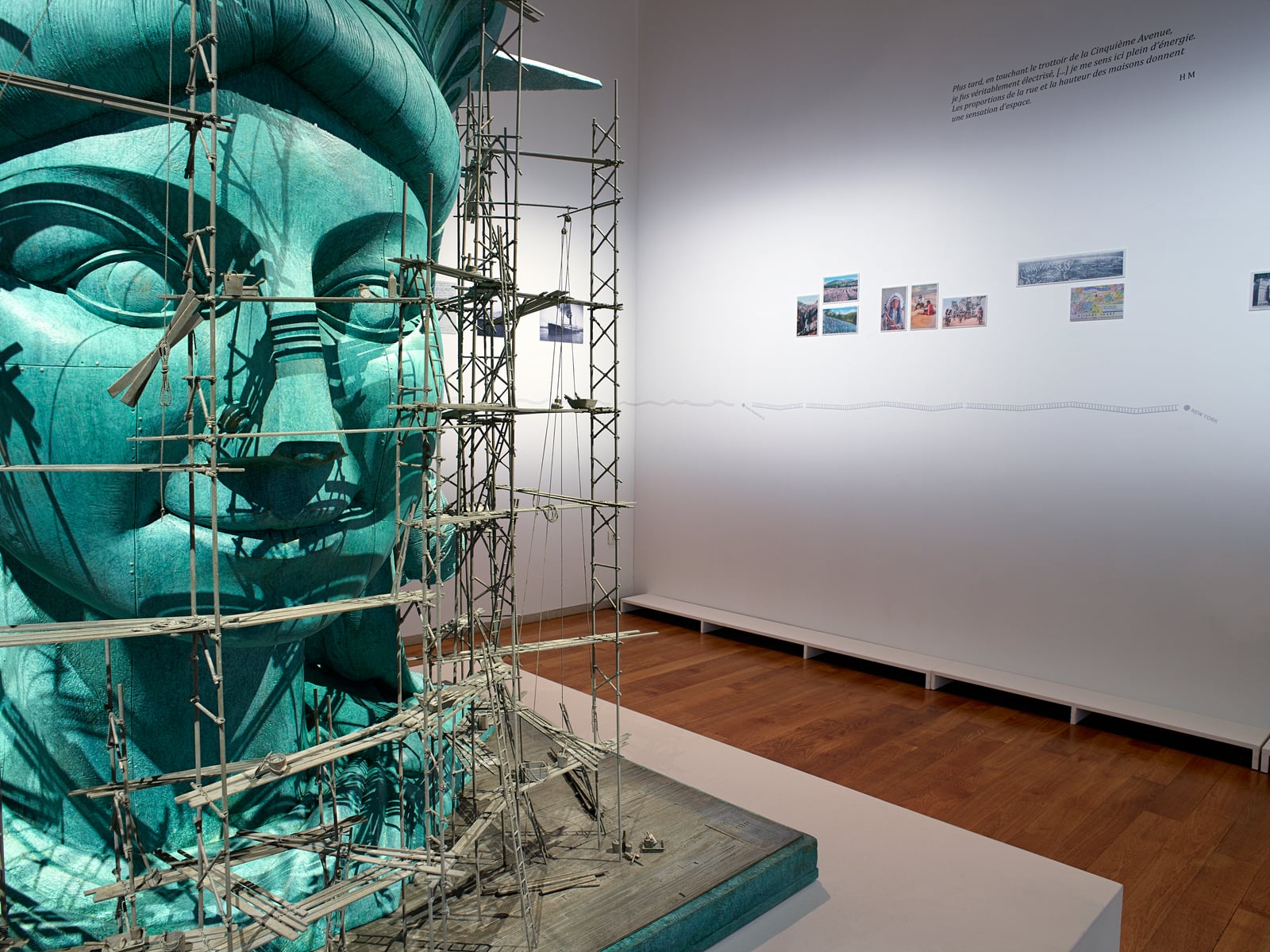Matisse-Godon exhibition view: Alain Godon's Statue of Liberty head under scaffolding in the main gallery of the Musée départemental Matisse